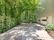 Long driveway leading to the side of the house with a garage at 5020 Bayberry Dr, Cumming, GA 30040