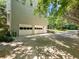 Side of house featuring an attached garage with a large driveway at 5020 Bayberry Dr, Cumming, GA 30040