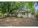 Backyard featuring a patio area and wooden fence, ideal for outdoor entertaining at 724 Bellemeade Nw Ave, Atlanta, GA 30318