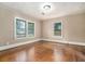 Spacious bedroom with hardwood floors and natural light from two windows at 724 Bellemeade Nw Ave, Atlanta, GA 30318