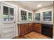 The kitchen showcases wood cabinets, natural light from multiple windows, and an eat-in area at 724 Bellemeade Nw Ave, Atlanta, GA 30318