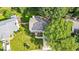 An aerial view of the house shows it's lush green lawn, driveway, and tasteful landscaping at 740 Paris Dr, Lawrenceville, GA 30043