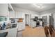 Modern kitchen with stainless steel appliances, including a refrigerator, oven, and white cabinets at 740 Paris Dr, Lawrenceville, GA 30043