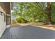 The spacious backyard featuring a deck perfect for relaxation and outdoor gatherings at 8649 Cedar Creek Rdg, Riverdale, GA 30274