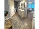 Bright bathroom featuring double sink vanity, stylish mirror, and a doorway view into the main bedroom at 227 Bennett Farms Trl, Acworth, GA 30102