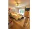 Inviting bedroom featuring a decorated headboard, hardwood floors, and lots of natural light at 227 Bennett Farms Trl, Acworth, GA 30102