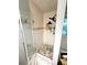 Glass enclosed shower featuring white subway tiles, shower niche, and a rainfall shower head at 227 Bennett Farms Trl, Acworth, GA 30102