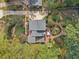 Aerial view of a home with a cozy backyard area featuring seating at 2653 Partridge Trl, Duluth, GA 30097