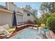 Well-appointed back deck featuring built-in seating and an outdoor rug for added comfort at 2653 Partridge Trl, Duluth, GA 30097