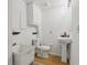 Small bathroom with sink, toilet and utility sink at 2653 Partridge Trl, Duluth, GA 30097