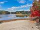 Sandy beach area by the lake, perfect for relaxation and enjoying the waterfront at 2653 Partridge Trl, Duluth, GA 30097