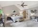 Bedroom featuring a spacious layout, vaulted ceilings, and a dedicated workspace at 2653 Partridge Trl, Duluth, GA 30097