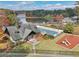 Community pool area with playground, picnic tables, and lake view at 2653 Partridge Trl, Duluth, GA 30097