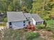 Aerial view of home, showcasing front porch and landscaping at 2653 Partridge Trl, Duluth, GA 30097