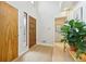 Welcoming foyer with hardwood floors and a view of the beautiful front door at 2653 Partridge Trl, Duluth, GA 30097