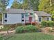 Charming two-story home with a welcoming front porch and beautiful landscaping at 2653 Partridge Trl, Duluth, GA 30097