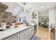 Modern kitchen with a spacious island, sleek countertops, and stainless steel appliances at 2653 Partridge Trl, Duluth, GA 30097