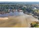 Scenic aerial view showcasing the lake and its shoreline at 2653 Partridge Trl, Duluth, GA 30097