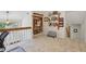 Upstairs landing with a built-in bookshelf and a view of the outdoors at 2653 Partridge Trl, Duluth, GA 30097
