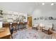 Bright living area featuring a kitchen bar, modern furniture, and neutral decor at 2653 Partridge Trl, Duluth, GA 30097