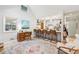 Bright open living space with vaulted ceilings, wood floors, and kitchen with breakfast bar at 2653 Partridge Trl, Duluth, GA 30097