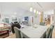 Open concept space showcasing living and dining spaces with an updated modern aesthetic at 2653 Partridge Trl, Duluth, GA 30097