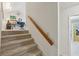 Carpeted stairway leads to an open landing with office space at 2653 Partridge Trl, Duluth, GA 30097