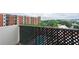 Enjoy the outdoor balcony, featuring lattice detail and an expansive view of the surrounding neighborhood and buildings at 300 Johnson Ferry Ne Rd # B808, Atlanta, GA 30328