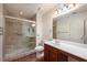 Bathroom featuring a tiled shower with a glass door, toilet, and single sink vanity at 300 Johnson Ferry Ne Rd # B808, Atlanta, GA 30328
