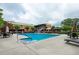 Relax by this sparkling community pool with comfortable lounge chairs and umbrellas, surrounded by beautiful landscaping at 300 Johnson Ferry Ne Rd # B808, Atlanta, GA 30328