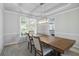 Formal dining room with classic trim and stylish lighting fixture at 4062 Brookside Pkwy, Decatur, GA 30034