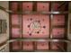 Unique ceiling with coffered design, wooden beams, lighting fixtures, and central chandelier at 114 Lees Lake Rd, Fayetteville, GA 30214