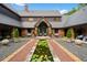 Beautiful exterior showcasing a lily pond, landscaping, and architectural details at 114 Lees Lake Rd, Fayetteville, GA 30214