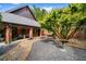 Beautiful exterior view of a home with a stone walkway, decorative foliage, and seating at 114 Lees Lake Rd, Fayetteville, GA 30214