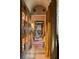 Long hallway with wooden cabinets and decorative curtains adds a unique touch to the home at 114 Lees Lake Rd, Fayetteville, GA 30214