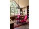Bright office with built-in bookshelves, large window and a charming writing desk at 114 Lees Lake Rd, Fayetteville, GA 30214