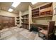 Well-appointed home office with built-in shelving, desk space, and stylish decor at 114 Lees Lake Rd, Fayetteville, GA 30214