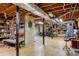 Unfinished basement area with shelving, work and recreational space, plus storage potential at 207 Lees Lake Rd, Fayetteville, GA 30214