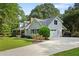 Home with attached garage and a long driveway at 207 Lees Lake Rd, Fayetteville, GA 30214