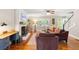 Bright living room with hardwood floors, fireplace, and comfortable seating with an open layout at 207 Lees Lake Rd, Fayetteville, GA 30214