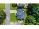 Aerial view of the home showing the layout of the house, surrounding greenery and neighborhood at 2688 Beddington Way, Suwanee, GA 30024