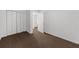 Bedroom featuring a large closet and neutral carpet at 2688 Beddington Way, Suwanee, GA 30024