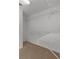 Walk-in closet with built-in shelving and carpet flooring at 2688 Beddington Way, Suwanee, GA 30024