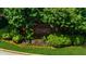 The Berkshire entrance sign is set off by colorful landscaping and mature trees at 2688 Beddington Way, Suwanee, GA 30024