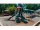 Community playground with slides and other fun features at 2688 Beddington Way, Suwanee, GA 30024