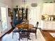 Cozy breakfast nook features a chandelier and access to the outdoors at 4745 Belcrest Way, Cumming, GA 30040