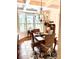 Charming dining room featuring bay windows, hardwood floors, and a chandelier at 4745 Belcrest Way, Cumming, GA 30040