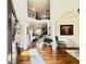 Welcoming foyer with hardwood floors, elegant staircase, and soaring ceilings at 4745 Belcrest Way, Cumming, GA 30040