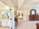 Hallway with neutral paint, plush carpet, and access to a luxurious ensuite bathroom at 4745 Belcrest Way, Cumming, GA 30040