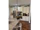 Lovely kitchen featuring stainless steel appliances, granite countertops, and white cabinetry at 4745 Belcrest Way, Cumming, GA 30040